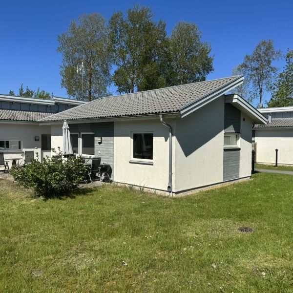 Skåningegård i grönområde.